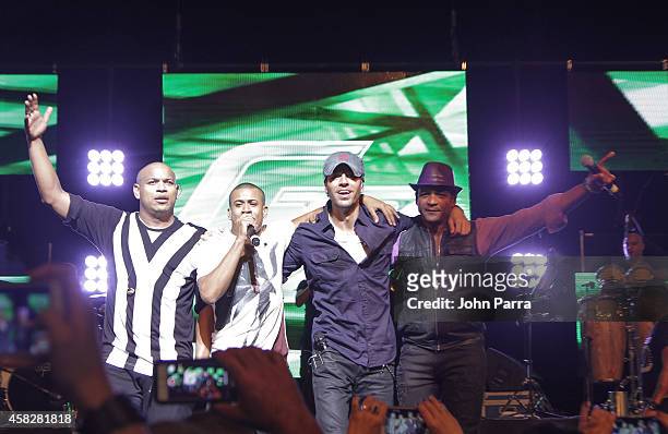 Gente De Zona,Descemer Bueno and Enrique Iglesias perform at James L Knight Center on November 1, 2014 in Miami, Florida.