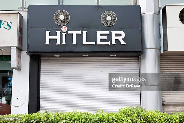 "hitler" store in ahmedabad- hot news - nazi swastika stock pictures, royalty-free photos & images