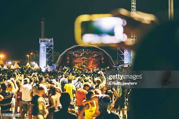 festival crowd. - benicassim stock pictures, royalty-free photos & images