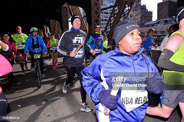 Analyst Mike Breen runs his leg in the 2014 NBA All-Star Relay during the TCS NYC Marathon on November 2, 2014 in New York City. NOTE TO USER: User...