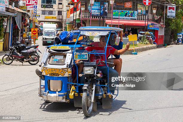 tricycle, sabang, philippines - gallera stock pictures, royalty-free photos & images