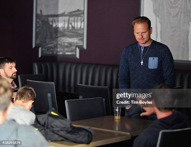 Nik Wallenda meets with his crew in the hours before his record-breaking high wire walk along the skyline on November 2, 2014 in Chicago, Illinois.