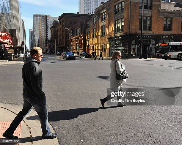 Nik Wallenda walks to the production office in the hours before his record-breaking high wire walk along the skyline on November 2, 2014 in Chicago,...