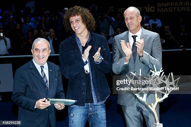 President of French Tennis Federation Jean Gachassin, Football player David Luiz and Director of the BNP Paribas Masters Guy Forget attend the Final...