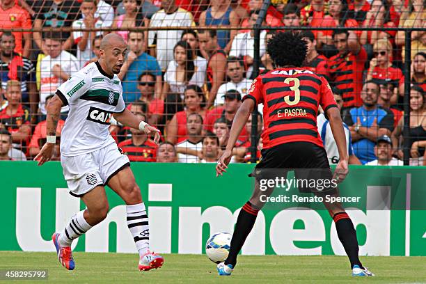 Everton Pascoa of Sport Recife battles for the ball with Mazola of Figueirense during the Brasileirao Series A 2014 match between Sport Recife and...