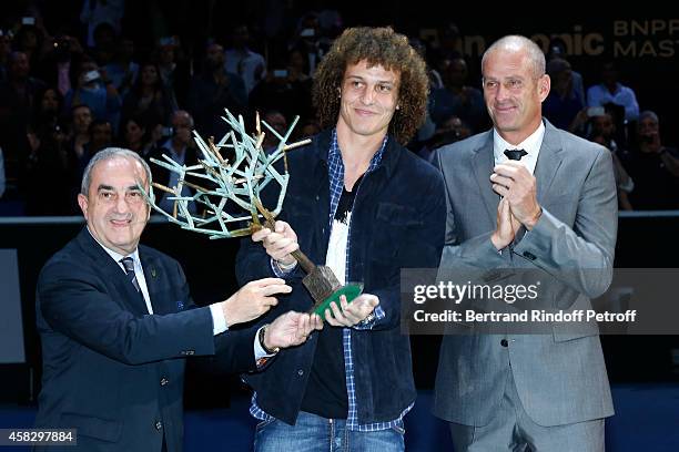 President of French Tennis Federation Jean Gachassin, Football player David Luiz and Director of the BNP Paribas Masters Guy Forget attend the Final...