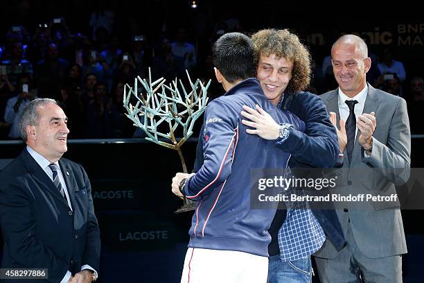 President of French Tennis Federation Jean Gachassin, winner of the tournament Novak Djokovic Football player David Luiz and Director of the BNP...