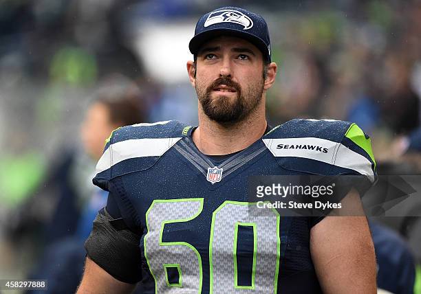 Center Max Unger of the Seattle Seahawks looks on from the sidelines during the first quarter of the game against the Oakland Raiders at CenturyLink...