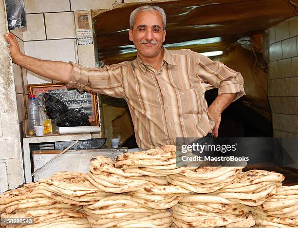 the pitta bread baker - artisanal food and drink stock pictures, royalty-free photos & images