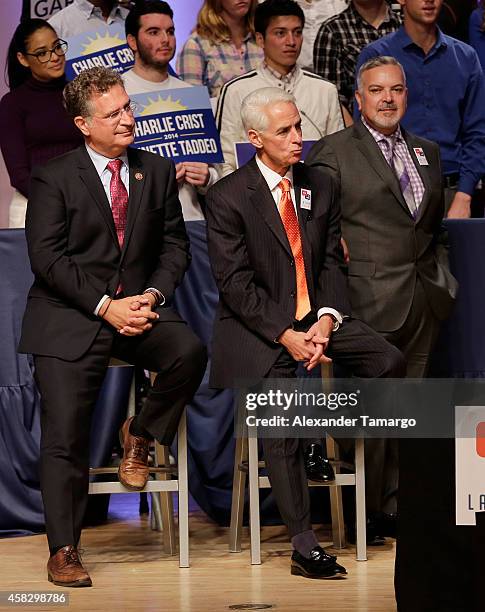 Joe Garcia, Charlie Crist and Henry Munoz are seen at the Latino Victory Project Rally at Florida International University on November 2, 2014 in...