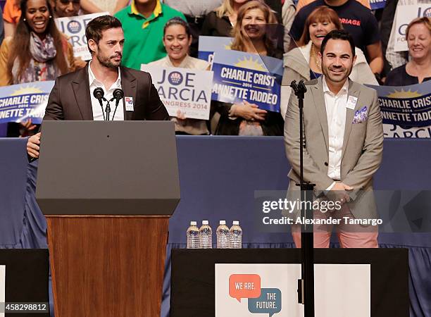 William Levy and Enrique Santos are seen at the Latino Victory Project Rally at Florida International University on November 2, 2014 in Miami,...