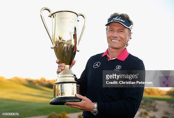 Bernhard Langer of Germany poses with the Charles Schwab Cup after winning the season championship which concluded in the final round of the Charles...