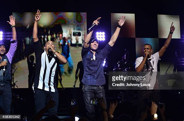 Gente De Zona, Descemer Bueno and Enrique Iglesias perform at James L Knight Center on November 1, 2014 in Miami, Florida.