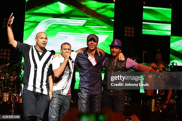 Gente De Zona, Descemer Bueno and Enrique Iglesias perform at James L Knight Center on November 1, 2014 in Miami, Florida.