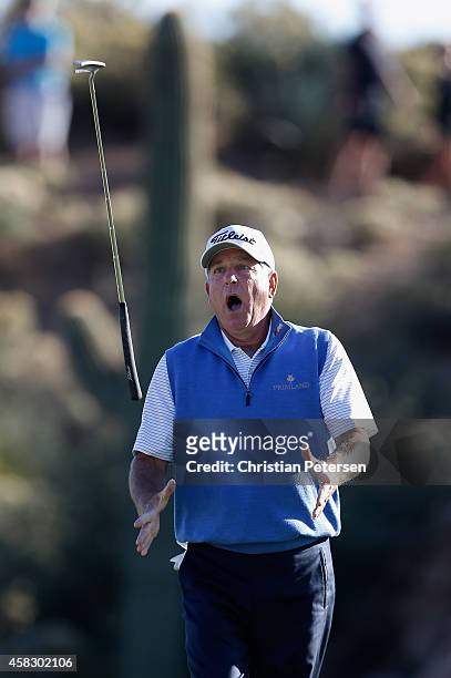 Jay Haas reacts after making a birdie putt on the 18th green during the final round of the Charles Schwab Cup Championship on the Cochise Course at...