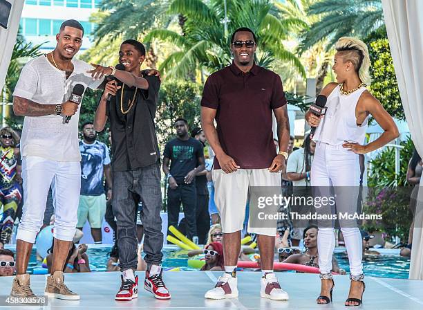 Damage, Christian Combs, Diddy and Sib Vicious attends Revolt Music Conference at Fontainebleau Miami Beach on October 17, 2014 in Miami Beach,...