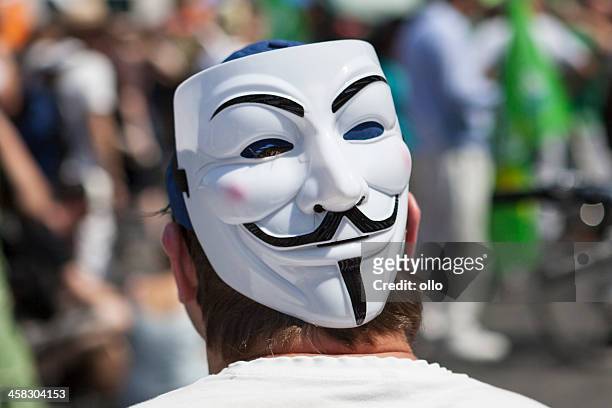 anti-prism demonstration, frankfurt - guy fawkes mask stock pictures, royalty-free photos & images
