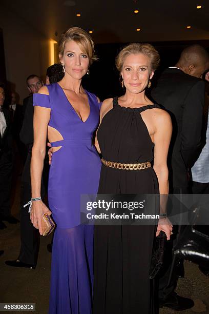 Tricia Helfer and Katie Sackoff attend amfAR LA Inspiration Gala honoring Tom Ford at Milk Studios on October 29, 2014 in Hollywood, California.