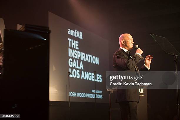 Byran Lourde speaks during the amfAR LA Inspiration Gala honoring Tom Ford at Milk Studios on October 29, 2014 in Hollywood, California.