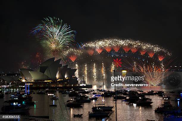 new year's eve fireworks in sydney - sydney fireworks stock pictures, royalty-free photos & images