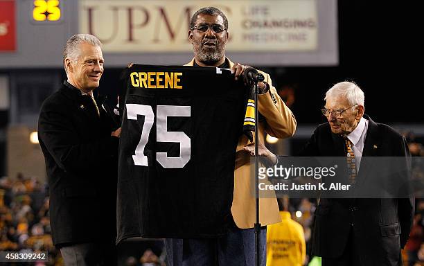 Former Pittsburgh Steelers defensive tackle Joe Greene has his number retired during a ceremony with Steelers President Art Rooney ll and Chairman...