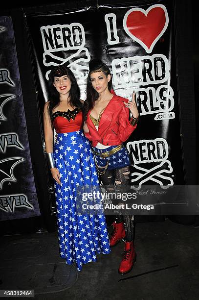 Cosplayers Kitt Quinn and Leanna Vamp both dressed as Wonder Woman attend Day 3 of the Third Annual Stan Lee's Comikaze Expo held at Los Angeles...