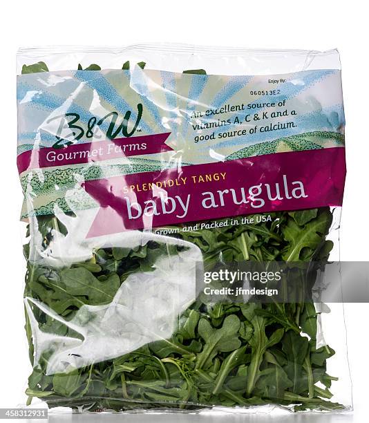 b&w gourmet farms splendidly tangy baby arugula salad bag - small packet stock pictures, royalty-free photos & images