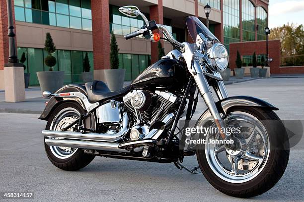 harley davidson fat boy motorcycle parked at an office complex - harley davidson 個照片及圖片檔