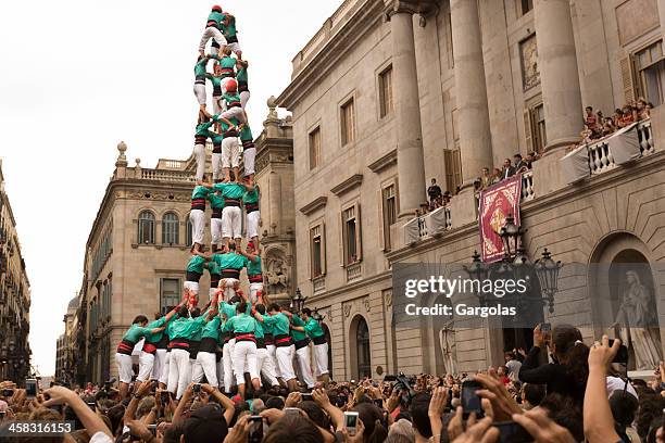 humans tower contest in barcelona merce 2012 - castell stock pictures, royalty-free photos & images