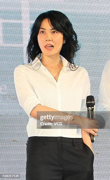 Singer Wang Fei attends press conference of new movie "Cling To Old Days" directed by Zhang Yibai on November 3, 2014 in Beijing, China.