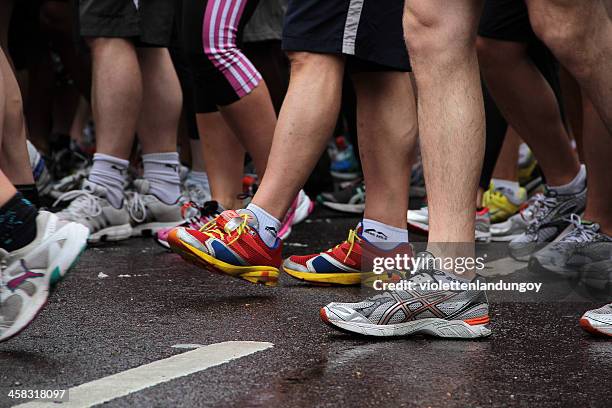 walking legs - nike shoes stock pictures, royalty-free photos & images