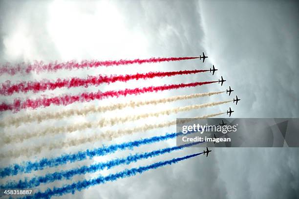 airplanes - red arrows in formation - red arrow plane stock pictures, royalty-free photos & images