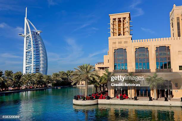 madinat jumeira and burj al arab - madinat jumeirah hotel stock pictures, royalty-free photos & images