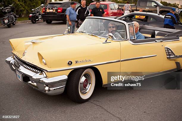 couple in their 1955 mercury montclair - mercury transit stock pictures, royalty-free photos & images