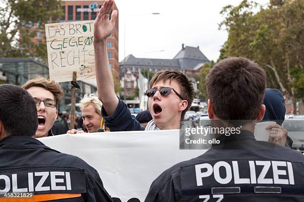 protests against npd election campaign - ss nazi party stock pictures, royalty-free photos & images