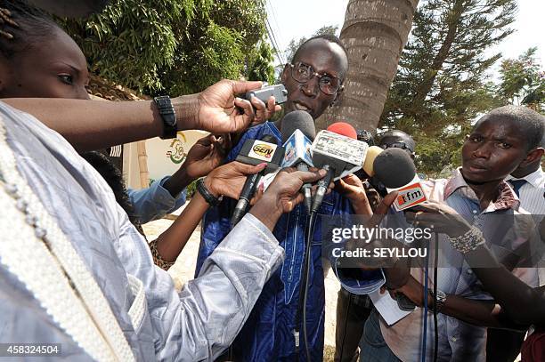 Aboubacry Mbodji, secretary general of the African Assembly for the Defense of Human Rights , speaks to journalists in front of the Burkina Faso...