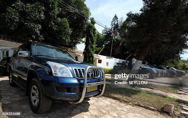 Vehicles of the Senegalese gendarmerie are parked outside the Burkina Faso embassy in Dakar on November 3 after the African Assembly for the Defense...