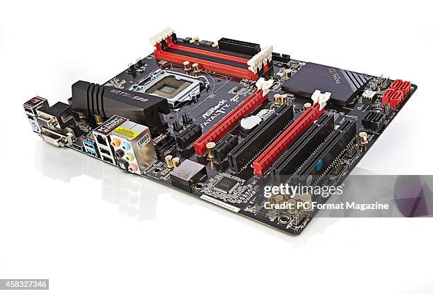 An ASRock Fatal1ty B85 Killer PC motherboard photographed on a white background, taken on March 7, 2014.