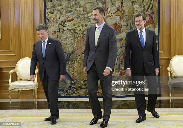 The President of Colombia Juan Manuel Santos Calderon, King Felipe VI of Spain and Prime Minister Mariano Rajoy attend a lunch meeting at Zarzuela...