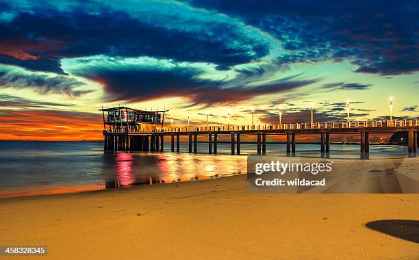 durban ushaka pier at sunrise - durban stock pictures, royalty-free photos & images