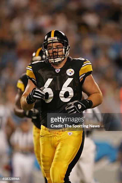 Alan Faneca of the Pittsburgh Steelers walking on to the field during a game against the Carolina Panthers on September 1, 2005 at the Bank of...