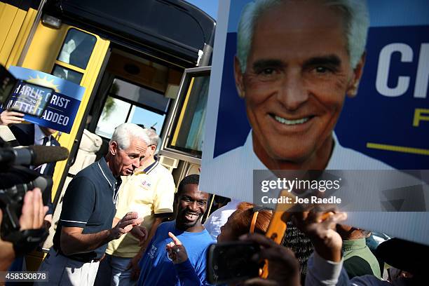Former Florida Governor and now Democratic gubernatorial candidate Charlie Crist greets people as he makes a campaign stop at the International...