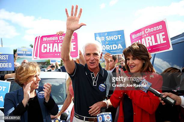 Former Florida Governor and now Democratic gubernatorial candidate Charlie Crist stands with Annette Taddeo , his Democratic lieutenant governor...
