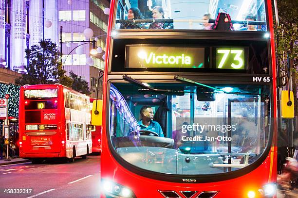busses in oxford street - bus driver stock pictures, royalty-free photos & images