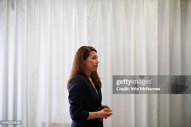 Democratic Senate candidate and Kentucky Secretary of State Alison Lundergan Grimes waits to speak off stage at the United Auto Workers hall November...