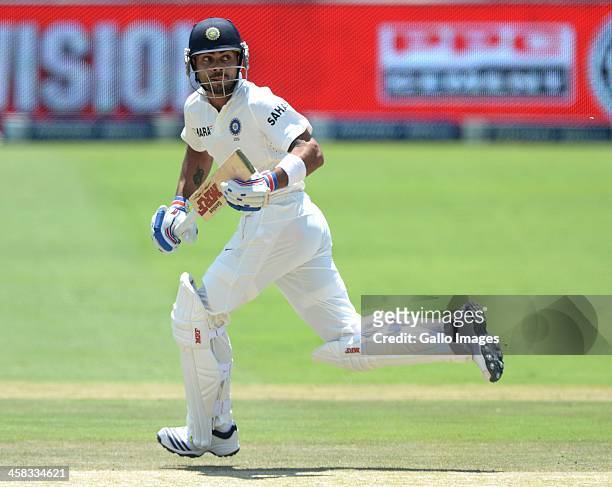 Virat Kohli of India runs a single during day 4 of the 1st Test match between South Africa and India at Bidvest Wanderers Stadium on December 21,...
