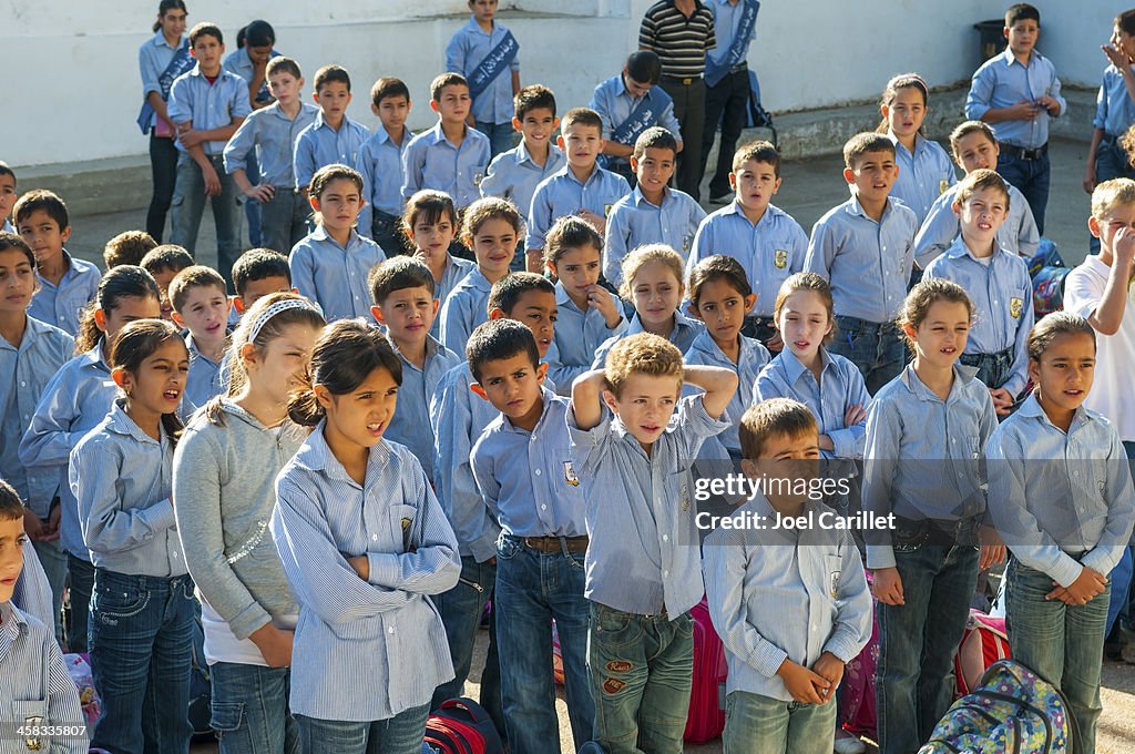 Palestinian students lining up for school