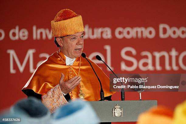 Colombia's President Juan Manuel Santos speaks during a ceremony where he receives an Honorary Doctorate at the Camilo Jose Cela university on...