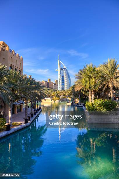 madinat jumeira and burj al arab - madinat jumeirah hotel stock pictures, royalty-free photos & images