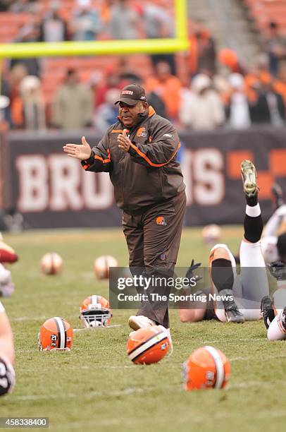 Head Coach Romeo Crennel of the Cleveland Browns gives instruction to his team during warm-ups before a game against the San Francisco 49ers on...